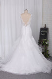 2024 Wedding Dresses V Neck Open Back Tulle With Applique And Beads Mermaid