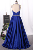 2024 Spaghetti Straps Open Back Prom Dresses Satin With Beading A Line