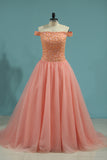 2024 Ball Gown Boat Neck Quinceanera Dresses Tulle With Beading