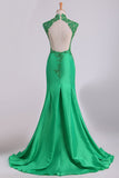 2024 High Neck Open Back Prom Dresses Taffeta With Beads And Applique Mermaid